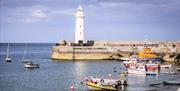 Donaghadee Lighthouse, harbour and boats.