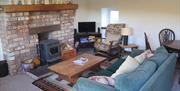 Living room area with woodburning stove