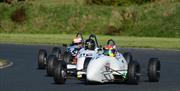 FF1600 racing is often close.  Ivor McCullough leading Dave Parks and Noel Robinson.