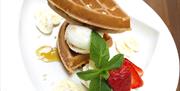 A photo of dessert, waffles and ice cream
