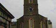 Image of the Clock tower of the church