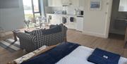 Open plan kitchen, living and bedroom