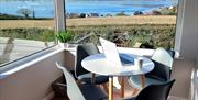 Inside seating area with views to Scrabo Tower