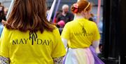 Local school children perform a traditional dance on May Day around Ireland's only Maypole