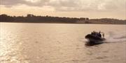 Rib on Strangford Lough at dusk