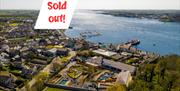 An aerial photo of portaferry with sold out note