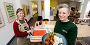 Artist Imogen Donegan and Nina Cristinacce of Lightfoot Kitchen and Deli in Seacourt Print Workshop, Bangor