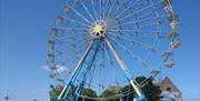 The Panoramic Wheel on daytime at McKee Clock Arena at Bangor seafront