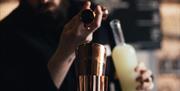 Shaun pouring drink