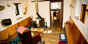 The sitting room with wood-burning stove.