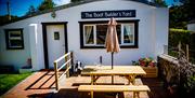 The Boat Builder’s Yard, Portaferry with Summer table and bench outside.