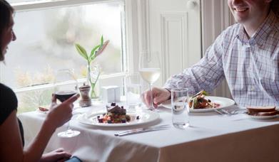 A couple enjoying a meal