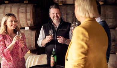 Tour group enjoys a tasting at Echlinville Distillery