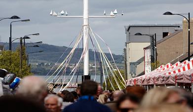 Image of Holywood Maypole dressed with ribbons for the annual May Day dancing event