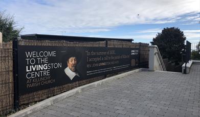 Exterior to the centre with welcome banner