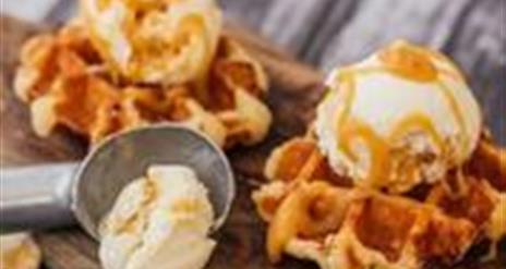 Ice cream scoop on waffles