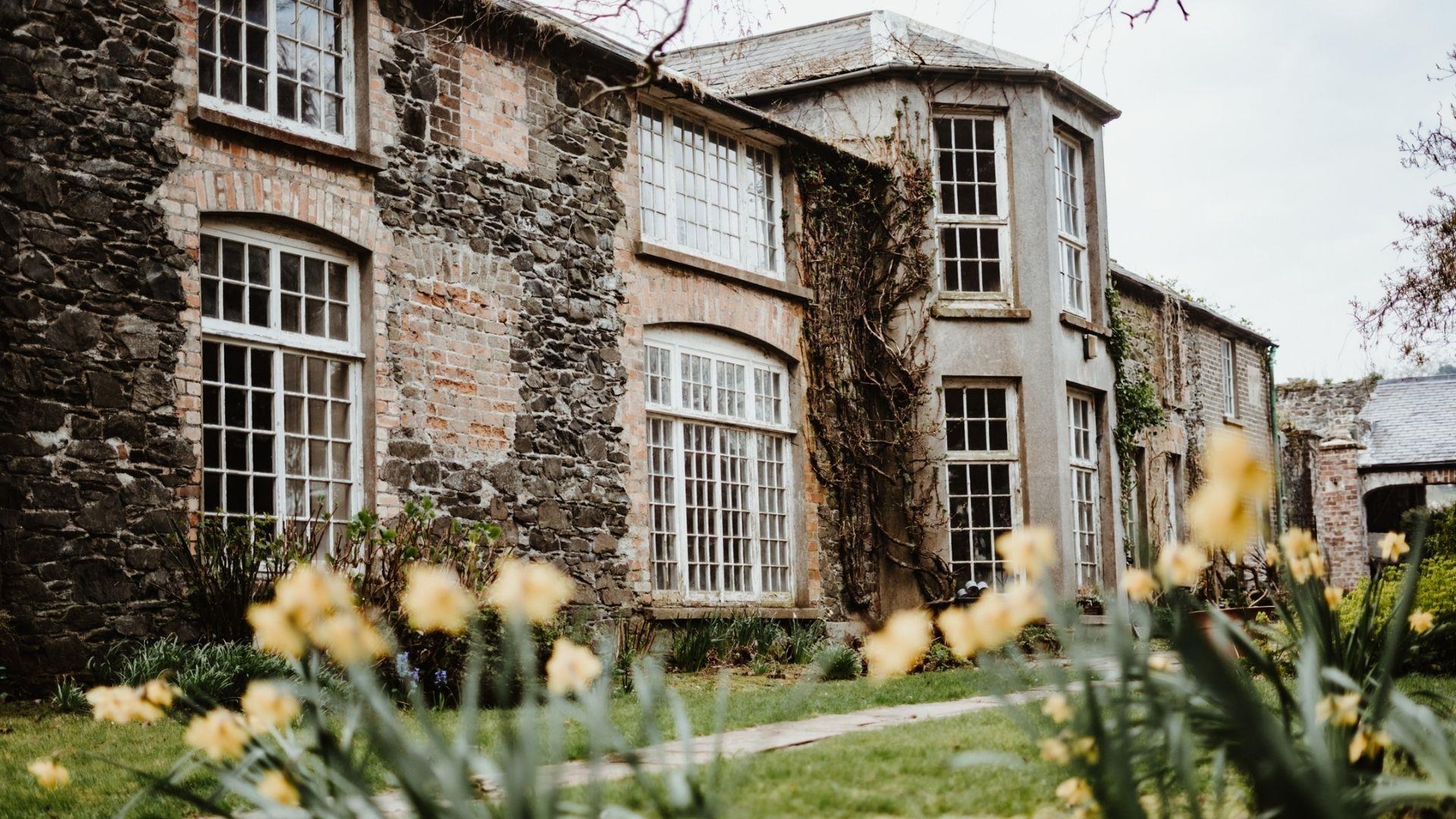 a photo of the house in the walled garden