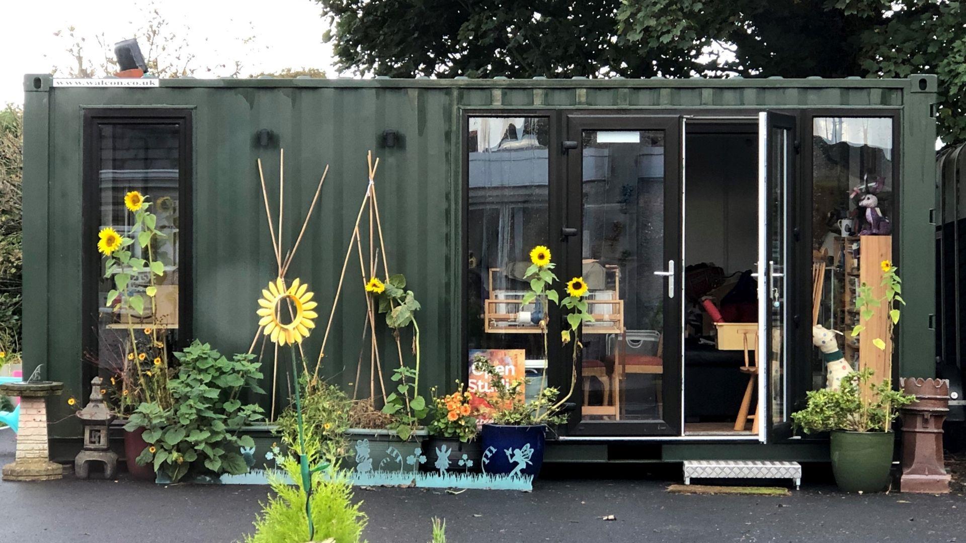 an image of an art studio made out of a storage container