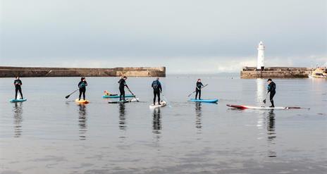 Stand up Paddleboarders in Donaghadee Harbour