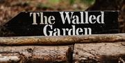 a photo of a sign saying the walled garden