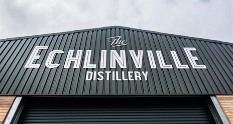 Photo of The Echlinville Distillery sign on exterior of building