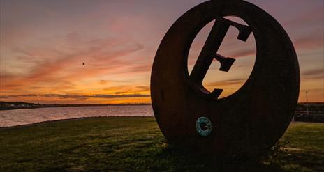 Sunset at Burr Point Ballyhalbert, E sculpture marking the most easterly point in Ireland.
