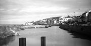 A black and white photo of the Long Hole and Seacliff Road in Bangor