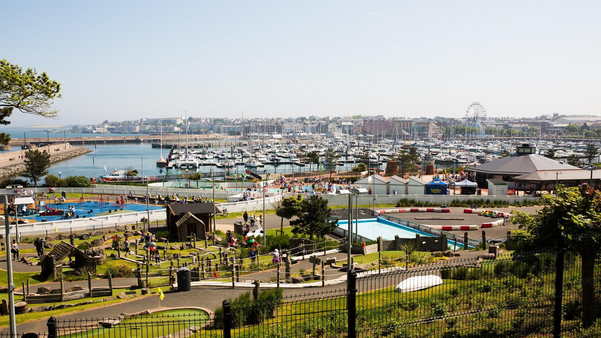 Photo taken on a summers day with a view over Pickie Funpark and the marina