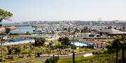 Photo taken on a summers day with a view over Pickie Funpark and the marina